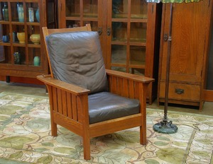  L J G Stickley vintage Morris chair with slats to the seat.